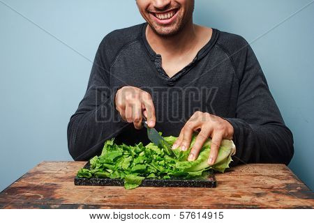 Man Chopping Lettuce