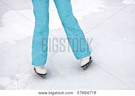 Young Girl Skating On The Frozen Lake