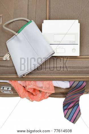 Sphygmometer On Suitcase With Tie And Panties