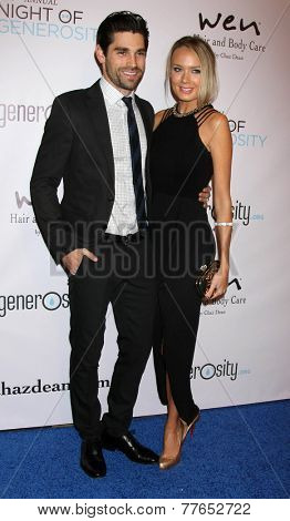 LOS ANGELES - DEC 5:  Justin Gaston, Melissa Ordway at the 6th Annual Night Of Generosity at the Beverly Wilshire Hotel on December 5, 2014 in Beverly Hills, CA