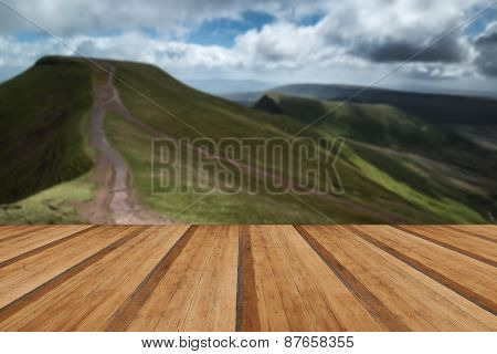 Beautiful Landscape Of Brecon Beacons National Park With Moody Sky With Wooden Planks Floor
