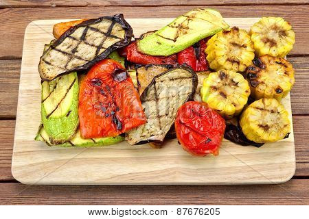 Grilled Vegetables On The Wood Background