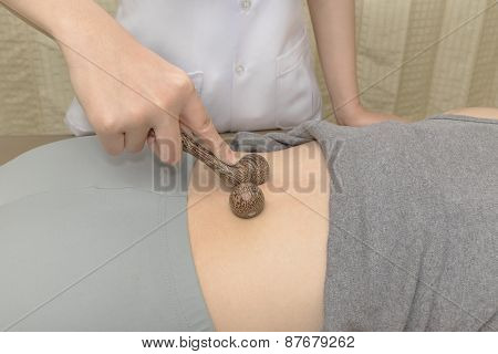 Masseuse treatment back pain pressing elbow into back muscle,Thai massage