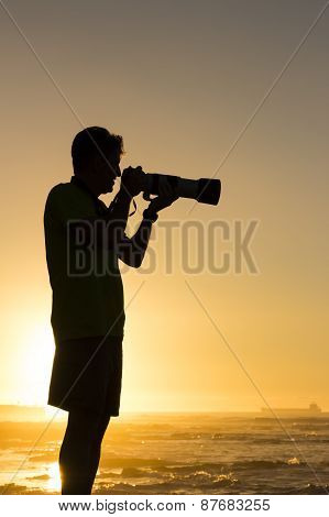 Silhouetted Travel Photographer