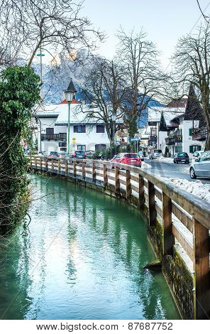 Street of a small alpine town in winter on a clear day