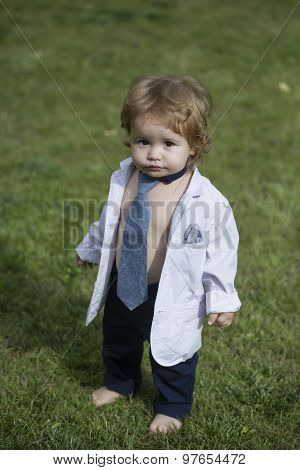 Stylish Baby Boy In Unbuttoned Shirt