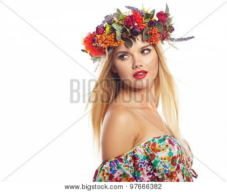 Slavic blonde girl in the flowers wreath