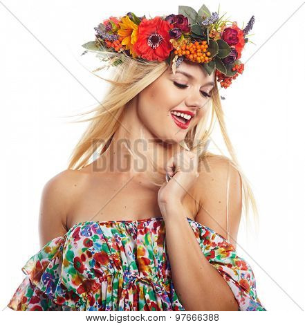 Slavic blonde girl in the flowers wreath