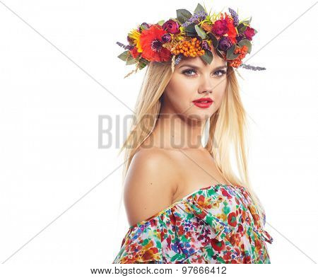 Slavic blonde girl in the flowers wreath