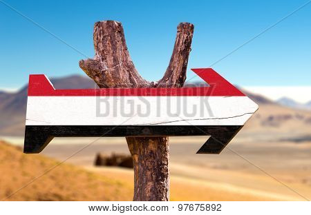 Yemen Flag wooden sign with desert background