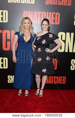 LOS ANGELES - MAY 10:  Amy Schumer, Kim Caramele at the 