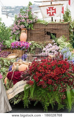 FUNCHAL MADEIRA PORTUGAL - SEPTEMBER 4 2016: Decorations with flowers during Madeira Wine Festival - Historical and Ethnographic parade in Funchal on Madeira. Portugal