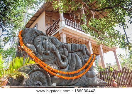 Sculpture of Sleeping Ganesha at Palolem, Goa, India.
