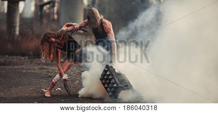 Battle of two mutants. They fight through smoke.