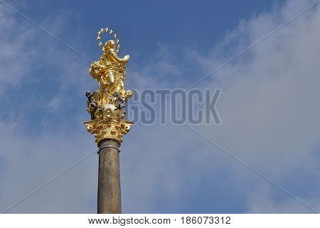 Golden top of the baroque Marian column (plague column) placed in Letohrad (Czech Republic) built in 1718