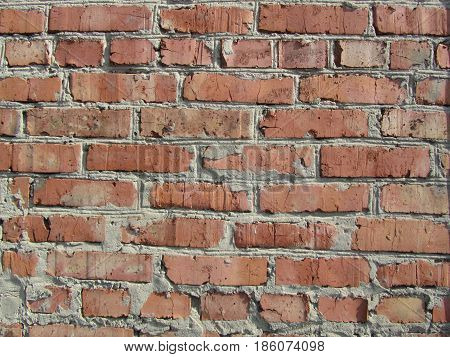 texture of the brickwork on the wall was built a long time