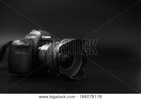 GOMEL BELARUS - May 12 2017: Canon 6d camera with lens on a black background. Canon is the world's largest SLR camera manufacturer