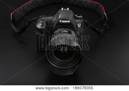 GOMEL BELARUS - May 12 2017: Canon 6d camera with lens on a black background. Canon is the world's largest SLR camera manufacturer