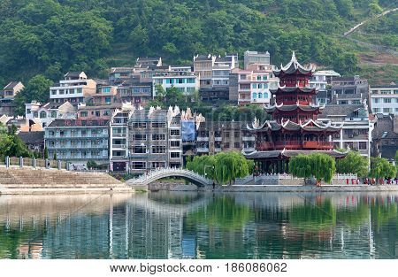 Beautiful pagoda in Zhenyuan Ancient Town on Wuyang river in Guizhou Province, China