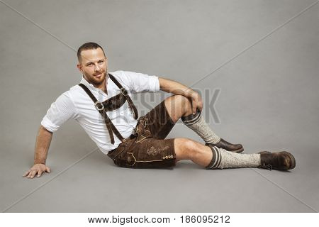 An image of a man in bavarian traditional lederhosen
