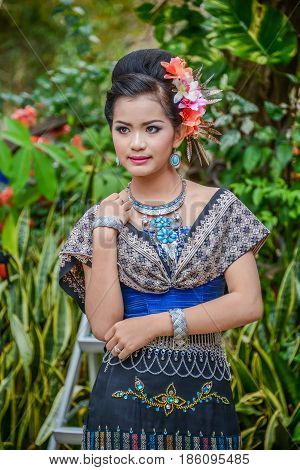 NAKORN PHANOM THAILAND - FEBRUARY 14 2015: Thai northeastern Phutai dancer with traditional costume in Phutai world event day in Renunakorn of Nakorn Phanom Thailand.