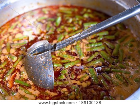 A cooking thai food in the kicthen