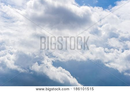 View on beautiful white clouds in a blue sky. Clouds and Skies in the Morning. 
The Sun behind Clouds. Fresh Air. Cloudy Weather. Cloud Formations. White Clouds