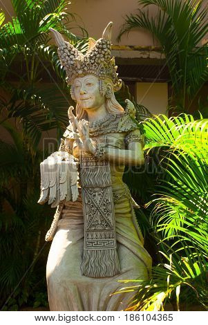 Beautiful Female Sculpture Made Of Stone. Bali, Indonesia.