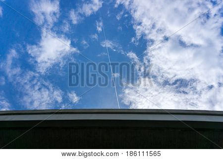 Close-up of a Bridge in front of cloudy sky.
Clouds and Skies in the Morning. 
The Sun behind Clouds. Fresh Air. Cloudy Weather. Cloud Formations. White Clouds