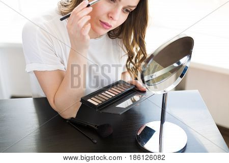 Woman Applying Make Up