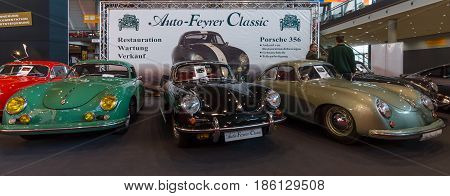 STUTTGART GERMANY - MARCH 02 2017: Various modifications of the sports car Porsche 356 stand in a row. Europe's greatest classic car exhibition 