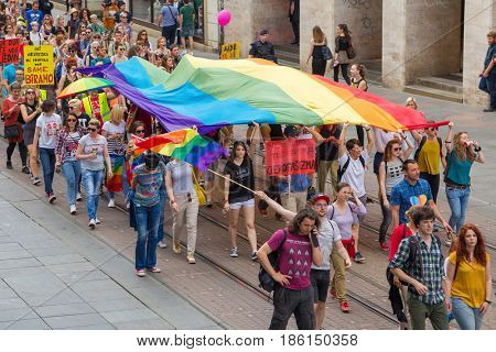 ZAGREB, CROATIA - JUNE 11, 2016: 15th Zagreb pride. LGBTIQ activists on Illica street heading to main square.