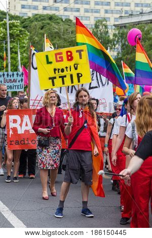 ZAGREB, CROATIA - JUNE 11, 2016: 15th Zagreb pride. LGBTIQ activists holding pride signs.