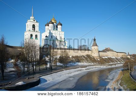 The last winter day on the Pskova river. View of the Trinity Cathedral in the Pskov Kremlin. Pskov, Russia