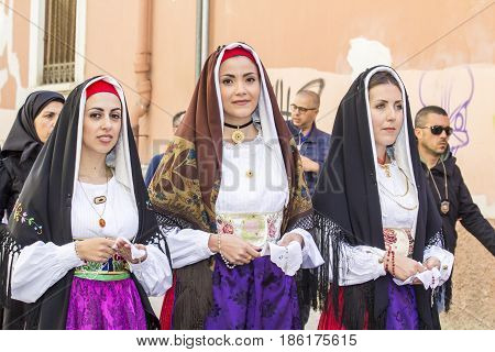 CAGLIARI, ITALY - MAY 1, 2017: 361 Religious Procession of Sant'Efisio - group of beautiful women dressed in traditional Sardinian costume - Sardinia