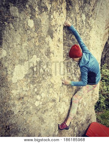 Climber to climb a big wall.Sport and healthy lifestyle concept.