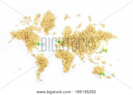 map of the world made of raw natural rice on white background with little green clothes pegs pointing sydney tokio new york and london