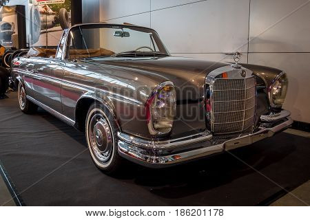 STUTTGART GERMANY - MARCH 02 2017: Full-size luxury car Mercedes-Benz 300 SE Cabriolet (W112) 1967. Europe's greatest classic car exhibition 