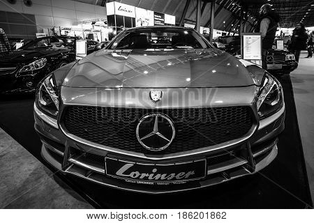 STUTTGART GERMANY - MARCH 02 2017: Sports car Mercedes-Benz SL350 (R231) 2012. Black and white. Europe's greatest classic car exhibition 