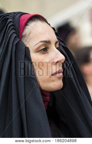 CAGLIARI, ITALY - MAY 1, 2017: 361 Religious procession of Sant'Efisio - portrait of a beautiful woman in traditional Sardinian costume - Sardinia