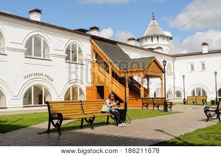 Tobolsk, Russia - July 15, 2016: Woman rests in interior of Guest Yard. Building of Gostiny dvor is built in 1703 - 1706 on project of architect, cartographer and historian of Siberia S. U. Remezov