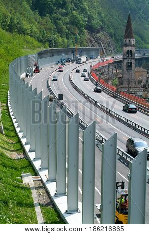Workers During The Installation Of Noise Barriers On The Highway