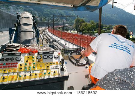 Workers And Vehicles During The Road Milling Of The Highway