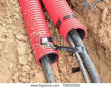 Wire In Hdpe And Protectivep Tube. Building Of Lines Of Metallic And Fiber Optic Cables,