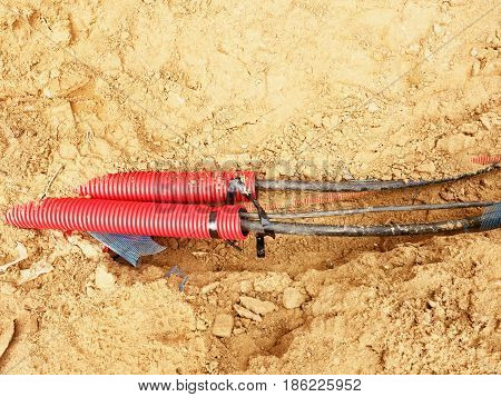 Wire In Hdpe And Protectivep Tube. Building Of Lines Of Metallic And Fiber Optic Cables,
