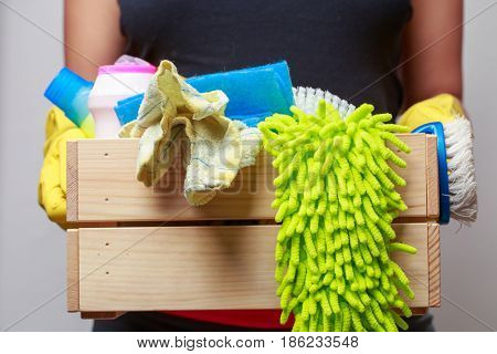 Man holding box of rags
