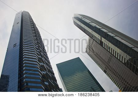 An upshot of three tall building skyscrapers.