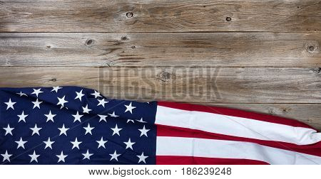Flay lay view of USA flag on rustic wooden boards horizontal format
