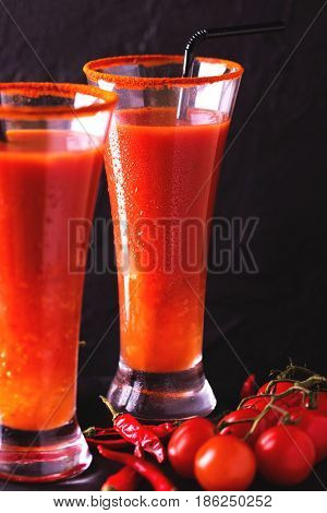 Bloody Mary Cocktail With Chili Pepper, Ice And Selery.