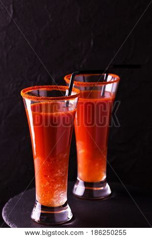 Bloody Mary Cocktail With Chili Pepper, Ice And Selery.